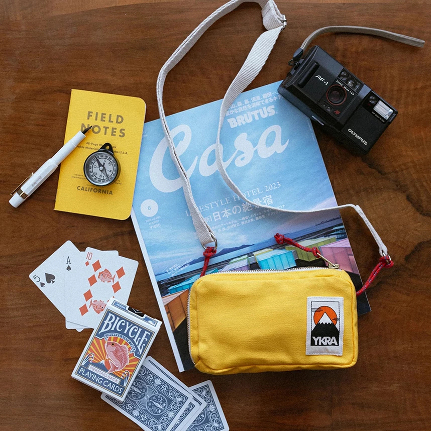 Az YKRA travel case sárga színben